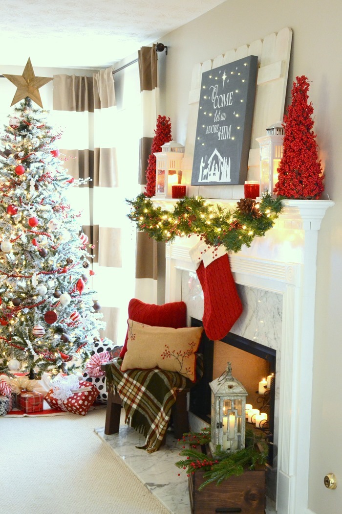 Red and festive Christmas mantel with DIY lit canvas