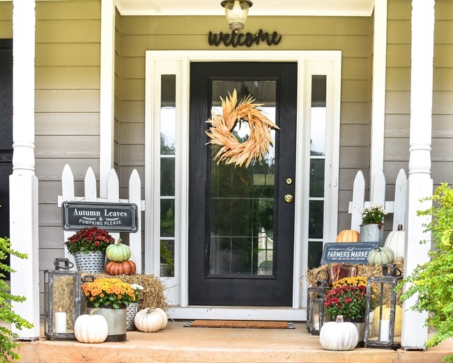 Farmhouse fall front porch with lots of mums, hay and pumpkins-21 Farmhouse fall front porch with lots of mums, hay and pumpkins-21
