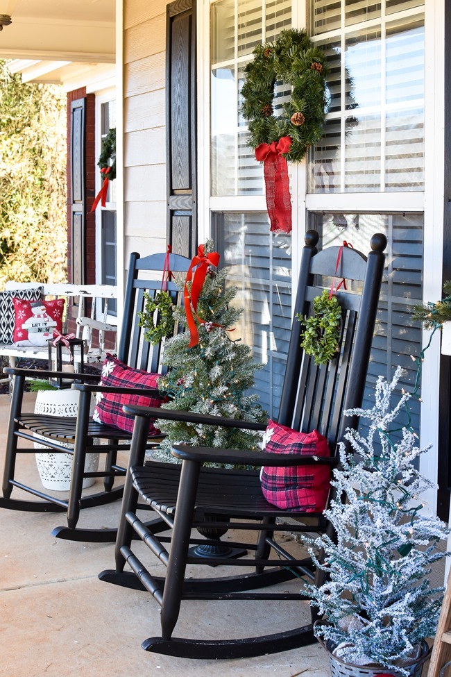 Farmhouse style Christmas front porch with picket fences-2